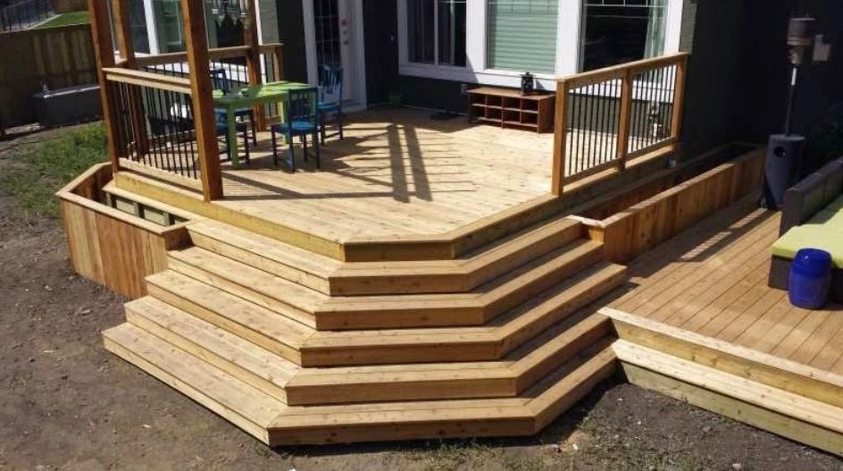 Multi-level cedar deck with wraparound steps